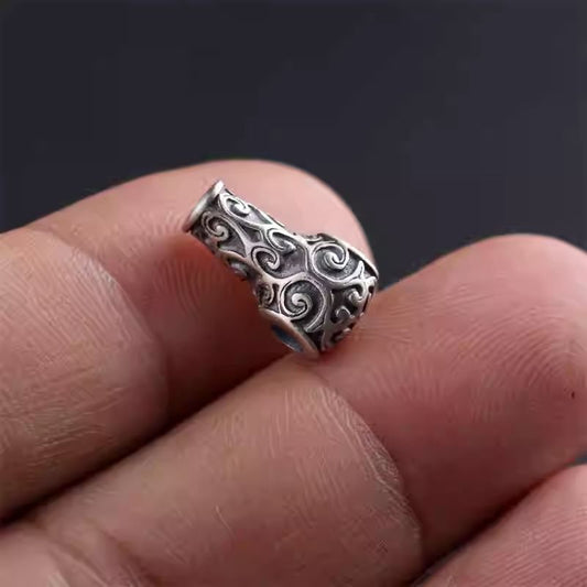 Tiny handmade silver mala beads from Tibetan Buddhist Jewelry Culture, exquisite hand-painted jewelry art for spiritual mindfulness.
