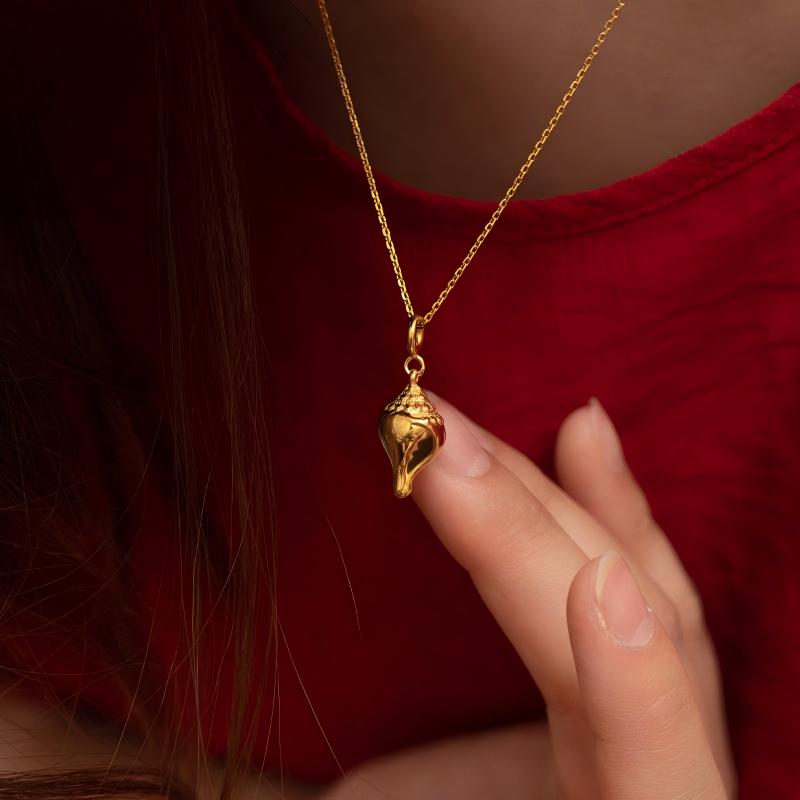  Hand-painted gold-plated Dharma Shell counter, showcasing traditional Tibetan Buddhist Jewelry Culture and exquisite Jewelry art.