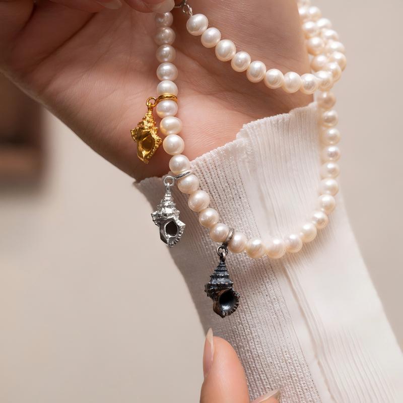 Tibetan Buddhist Jewelry Culture handmade gold-plated silver conch pendant, a spiritual piece of Jewelry art for peace.