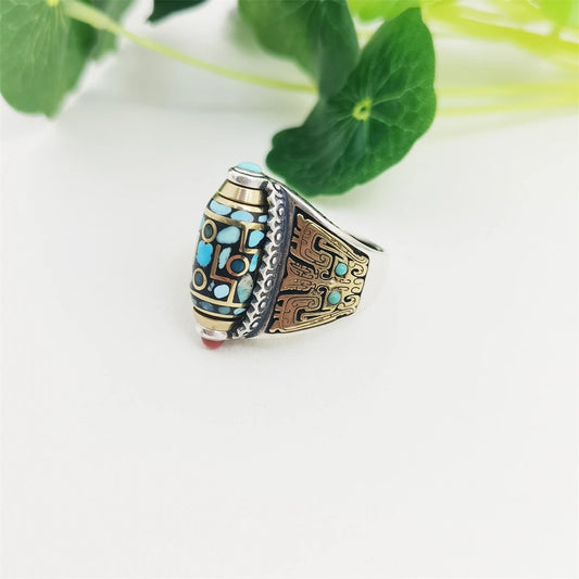  Intricate hand-carved rotating 9-Eyes ring, showcasing artisan jewelry art inspired by Tibetan Buddhist Jewelry Culture.