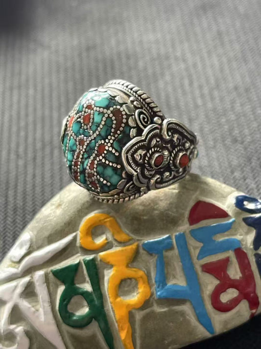 Authentic Tibetan Buddhist Jewelry Culture ring crafted from 925 silver with a natural green turquoise stone and hand-painted artisan jewelry art.