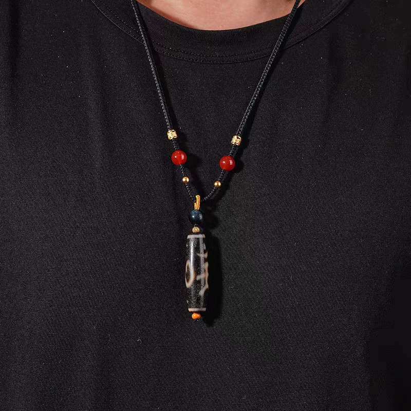 Purely handmade Dzi bead necklace with meticulous spiritual art, reflecting the heritage of Tibetan Buddhist Jewelry Culture jewelry art.