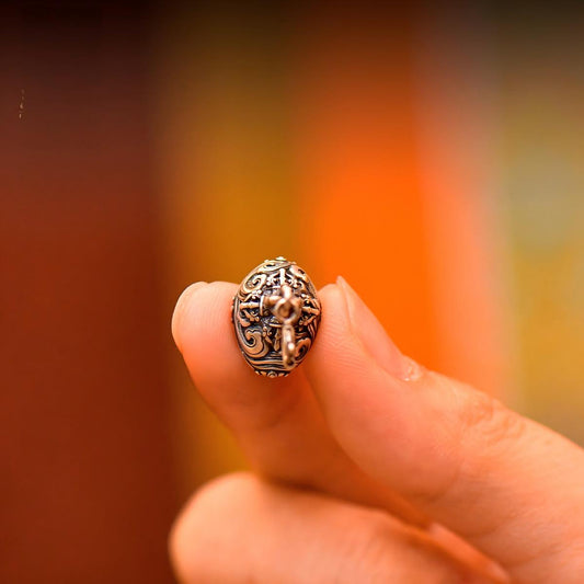 Tibetan Buddhist Jewelry Culture: A handmade sterling silver Kazi pendant/connector, ideal for mala beads, showcasing jewelry art.