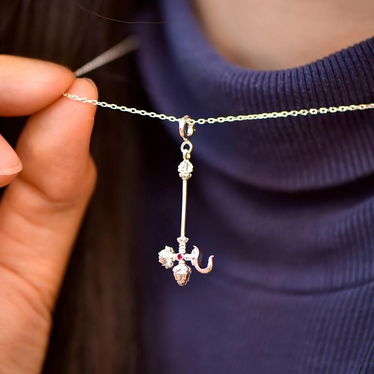 Tibetan Buddhist Jewelry Culture: A handmade sterling silver Vashya Hook necklace, showcasing sacred Buddhist jewelry art and attraction symbols.
