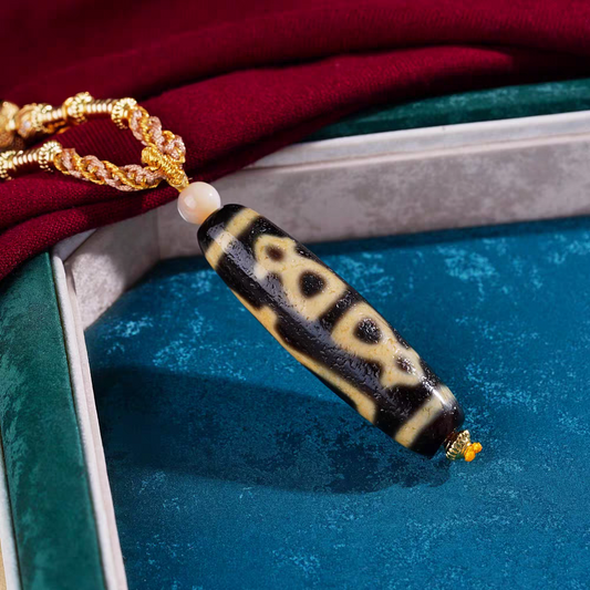Tibetan Buddhist Jewelry Culture five wealth gods (Jambala) pendant necklace. A sacred piece of jewelry art in natural agate for prosperity. Source
