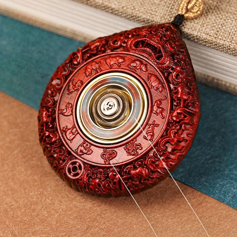 Exquisitely handcrafted blackwood Zodiac Guardian pendant, featuring double-sided Birth Buddha carvings, inspired by Tibetan Buddhist jewelry culture, perfect for meditation, daily wear, or meaningful gifting.