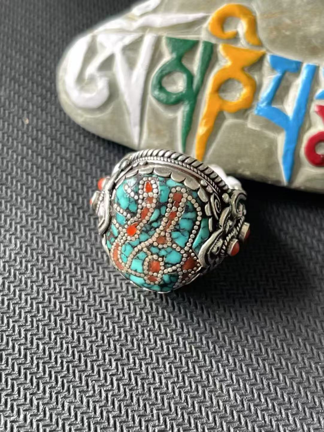 Artisan-crafted 925 silver ring with turquoise, showcasing Tibetan Buddhist Jewelry Culture and unique jewelry art for spiritual fashion lovers.