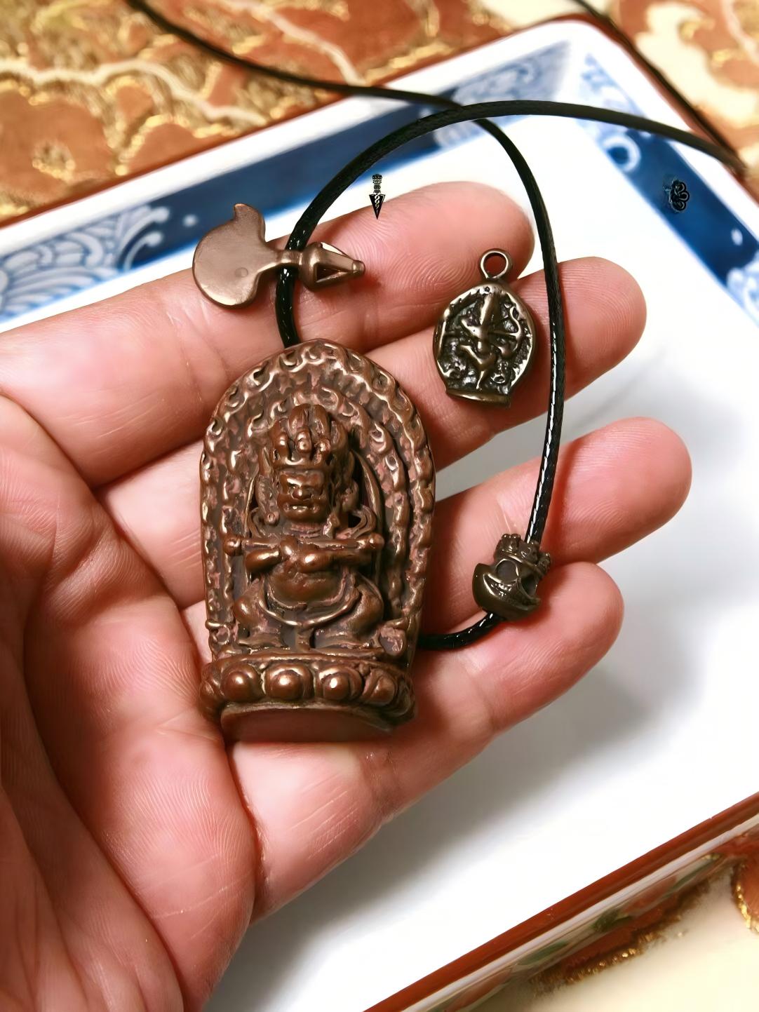 Handcrafted bronze Mahakala figure with Baogang Huozhu design, inspired by Tibetan Buddhist Jewelry Culture, showcasing intricate hand-painted details and spiritual significance