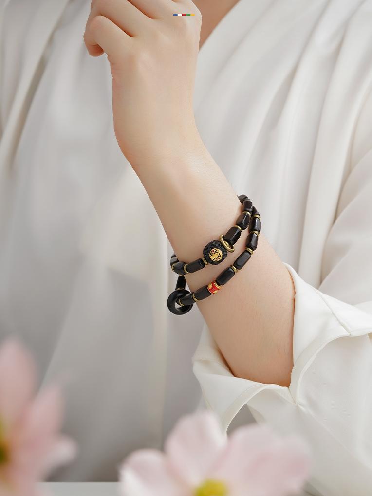 A vibrant and unique sandalwood bracelet showcasing exquisite craftsmanship, infused with the charm of Tibetan Buddhist culture.