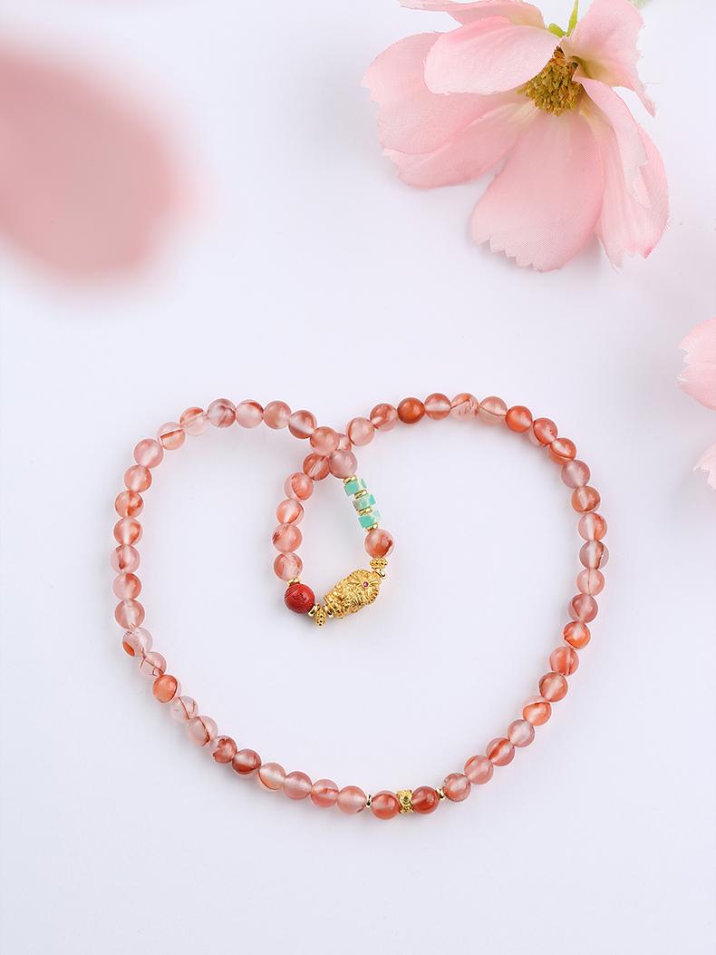 Tibetan Buddhist Jewelry Art: Cinnabar Glass Multi-Strand Blessing Bracelet carrying sacred Tibetan Buddhist mantras and symbols