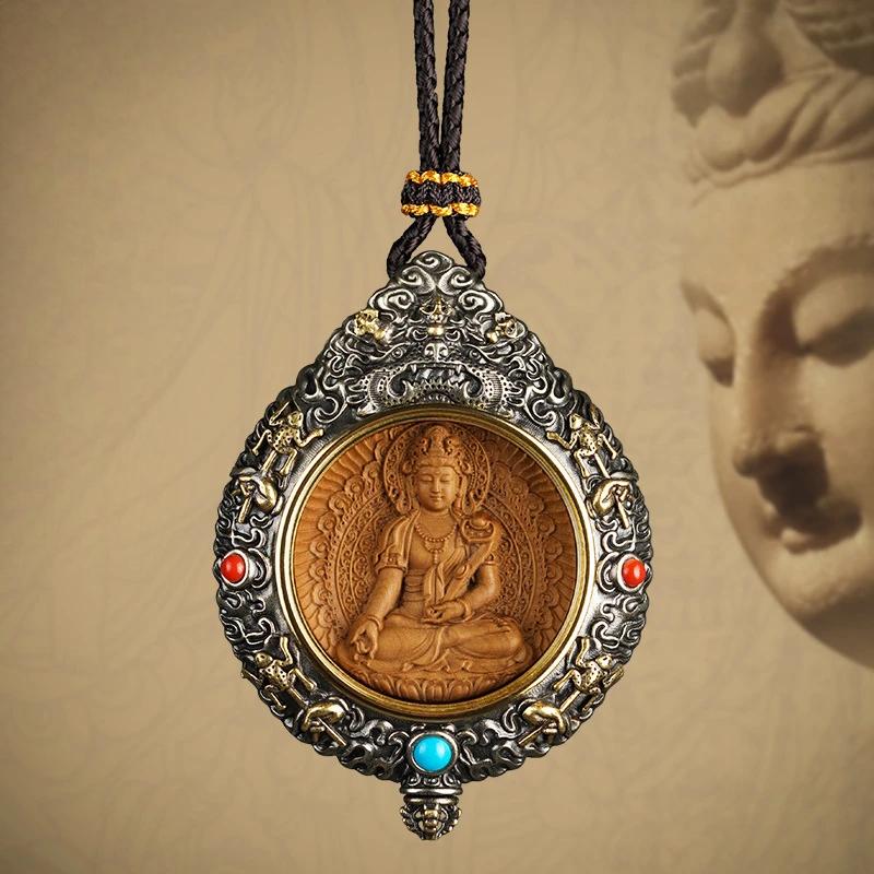 Handcrafted copperwood pendant inlaid with silver and sandalwood, featuring Zodiac Birth Buddha design, inspired by Tibetan Buddhist jewelry culture and fine jewelry art, perfect for daily wear or spiritual protection.