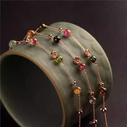 Handcrafted Tibetan silver bracelet plated with rose gold, featuring natural tourmaline, minimalist and elegant design for versatile daily wear.