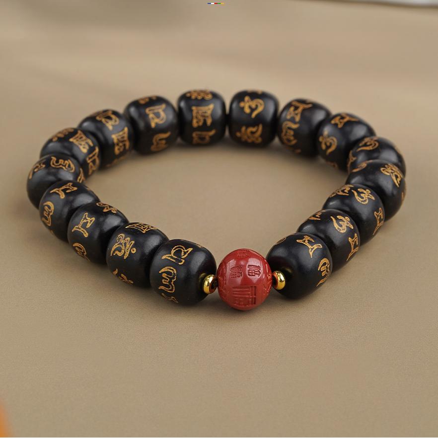 Classic ebony and red sand prayer beads, symbolizing the fusion of wealth and spirituality.