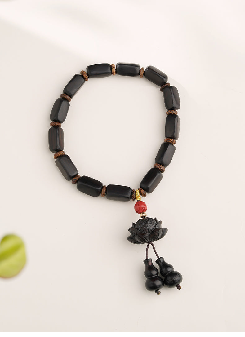 Ebony square lotus bead bracelet, inspired by Tibetan Buddhism, featuring unique designs and craftsmanship, suitable for everyday wear and meditation use.