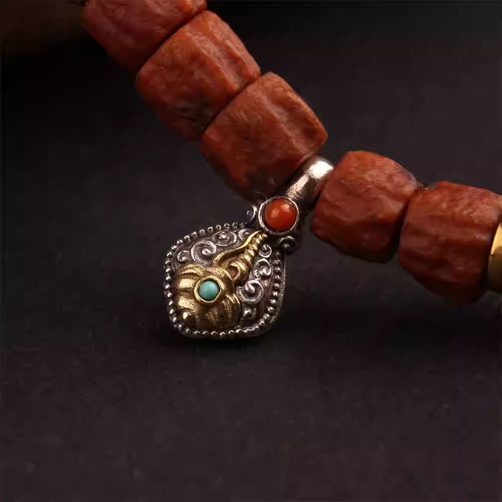 Tiny handmade sterling silver mala beads representing Tibetan Buddhist Jewelry Culture, exquisite micro jewelry art for meditation.