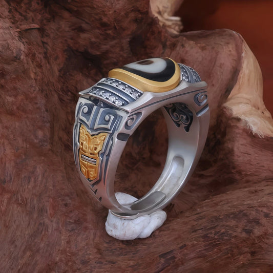 Artisan hand-painted Wu Lu Cai Shen ring, showcasing traditional Tibetan Buddhist Jewelry Culture and intricate jewelry art techniques.