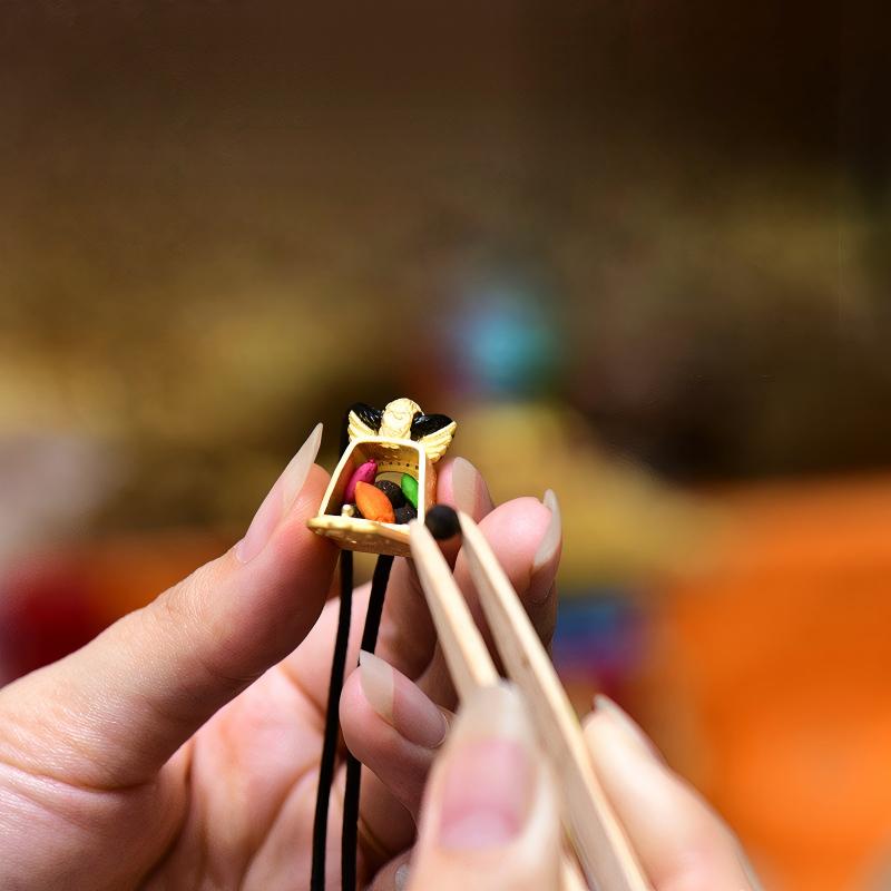 Tibetan Buddhist Jewelry Culture: A handmade sterling silver black gold Garuda Gau box pendant, showcasing sacred Buddhist jewelry art and powerful protection symbols.