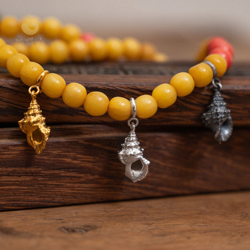  Hand-painted silver gilded Dharma Shell necklace, showcasing traditional Tibetan Buddhist Jewelry Culture and exquisite Jewelry art.
