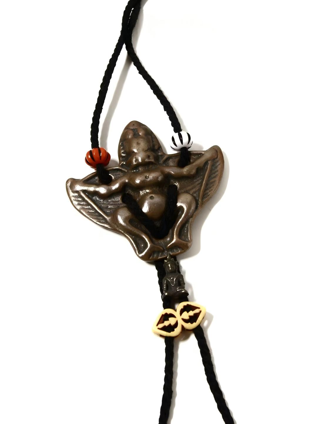 Handcrafted Golden Winged Bird Lima copper figure, representing spiritual strength and protection in Tibetan Buddhist Jewelry Culture, perfect for meditation and spiritual growth.