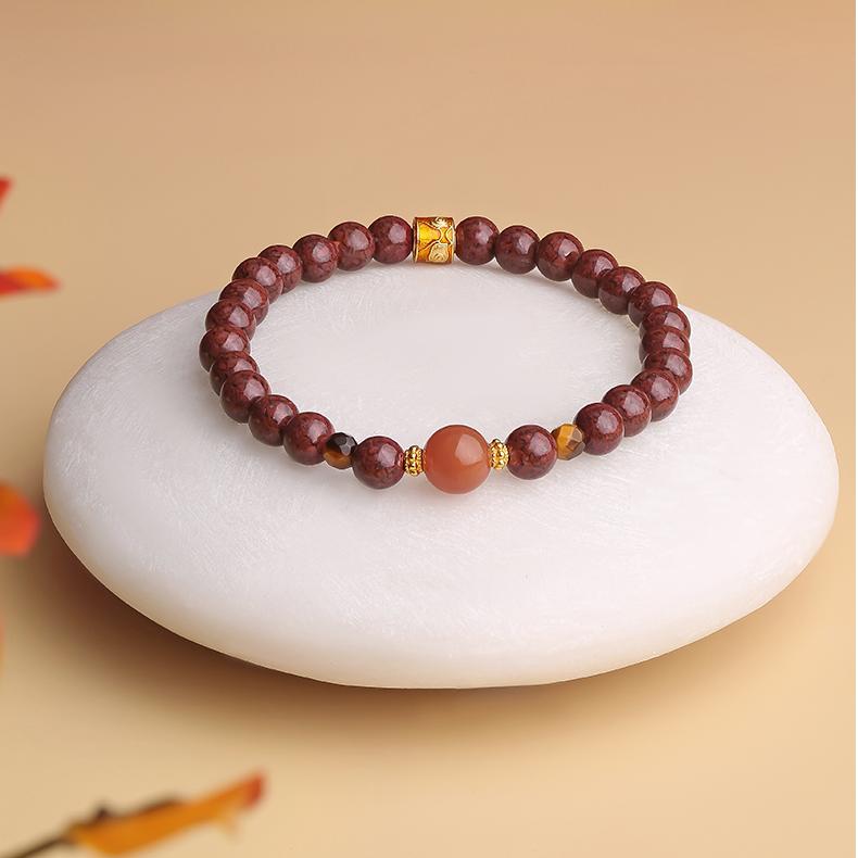 Hand-Painted 'Great Blessings' Cinnabar Bracelet from Tibetan Buddhist Jewelry Art, symbolizing the flow of abundance and spiritual goodness.