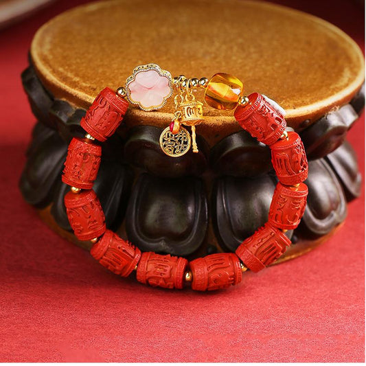 Tibetan Buddhist Jewelry Art: Hand-Painted Cinnabar and Amber Lotus Pod Bracelet for purity and spiritual enlightenment in Tibetan Buddhist tradition