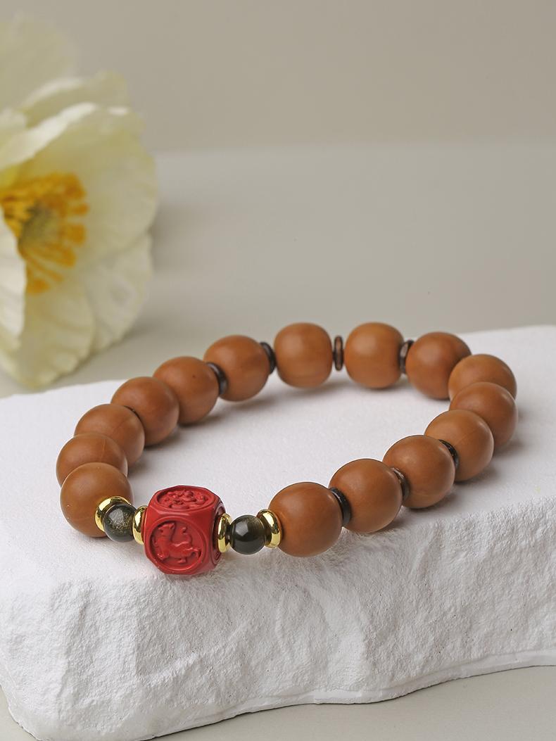 Tibetan Buddhist Jewelry Culture: Handmade Cinnabar Monkey Head Beads Bracelet featuring sacred monkey symbolism in Buddhism