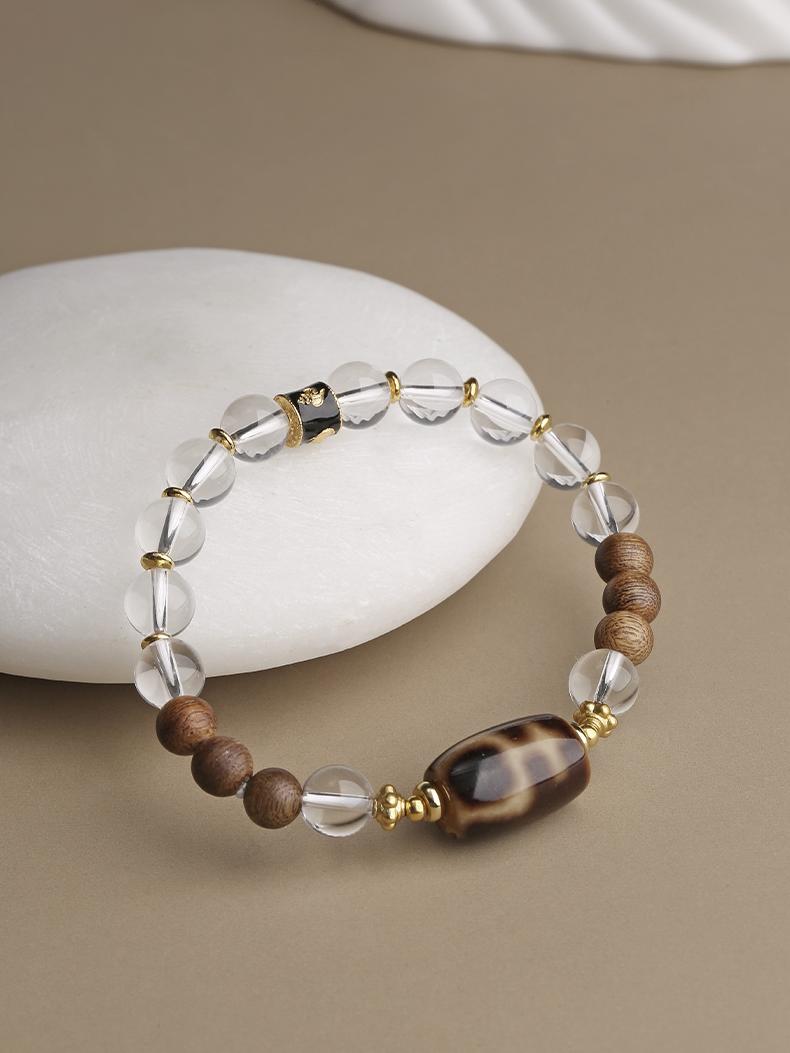 Tibetan Buddhist Jewelry Art: Hand-Painted Clear Quartz Dzi Beads Bracelet featuring sacred Tibetan Buddhist symbols and mantras