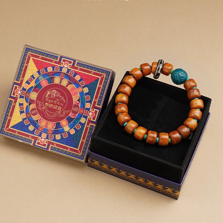 Tibetan Buddhist Jewelry Culture: Hand-Painted Yak Bone Incense Ash Mala Bracelet featuring traditional Tibetan designs
