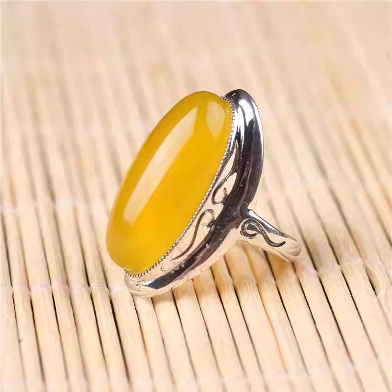Hand-painted vintage silver ring with natural yellow gemstone, a sophisticated Jewelry art accessory.