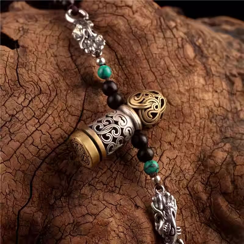 Traditional Makara seal amulet crafted from sterling silver, representing the essence of Tibetan Buddhist Jewelry Culture and Jewelry art.