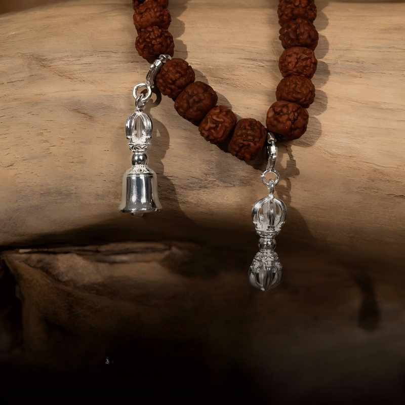 Artisan-crafted gold-plated bell and dorje accessory, perfect for wisdom and compassion and Jewelry art style.