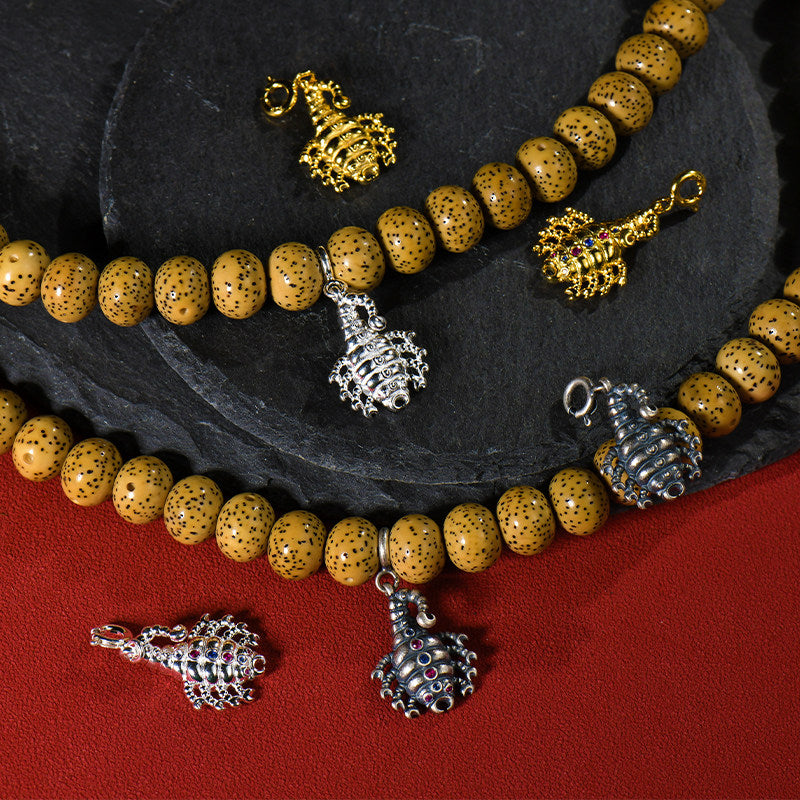  Artisan-crafted silver gilded scorpion accessory, perfect for dispelling negative energy and Jewelry art style.
