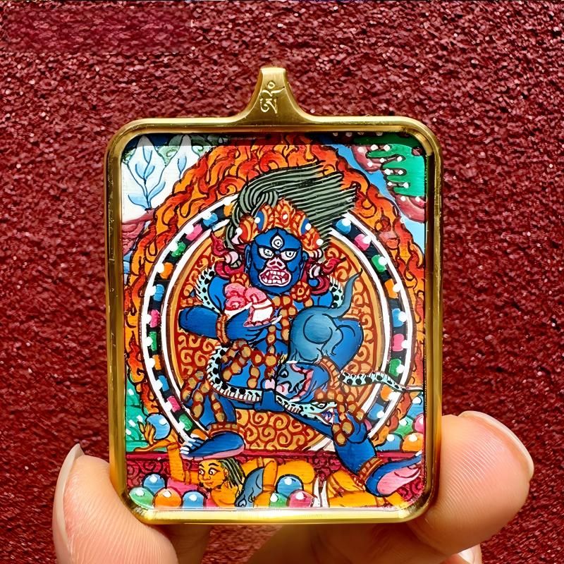 Hand-painted Tibetan Buddhist Black Jambhala pendant with small Thangka in Gau box, handcrafted jewelry art offering protection, wealth, and spiritual blessings.