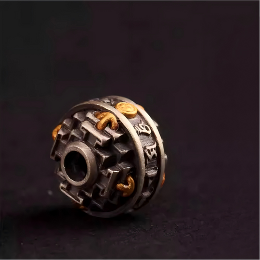Handcrafted Tibetan silver beads plated with gold, featuring mandala and six-syllable mantra spacers, elegant and spiritual accessory for bracelets.