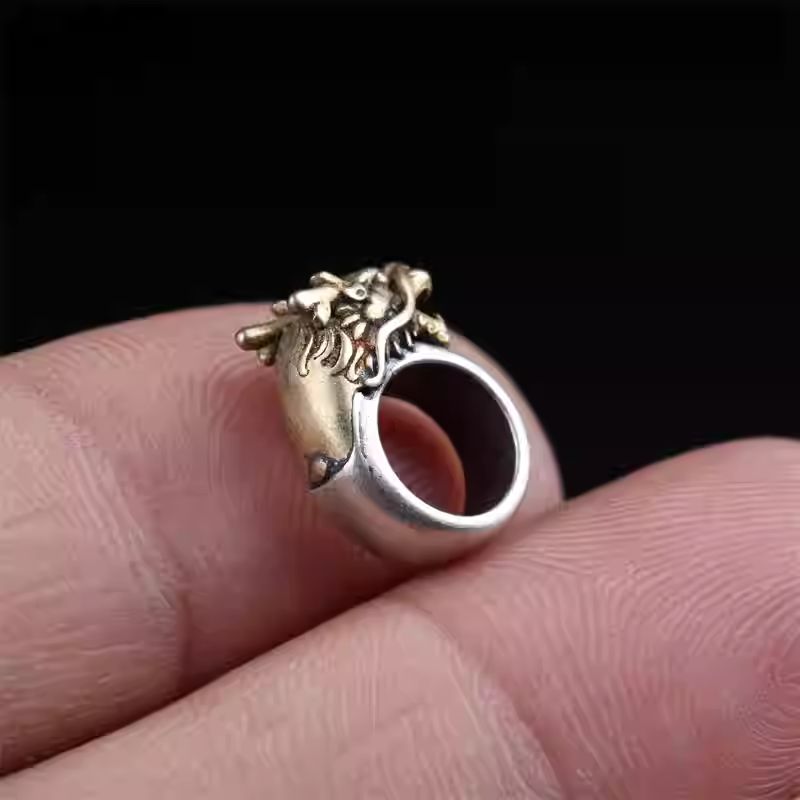 Authentic handmade silver copper dragon head spacer bead, showcasing jewelry art and Tibetan Buddhist Jewelry Culture. Purely handcrafted.