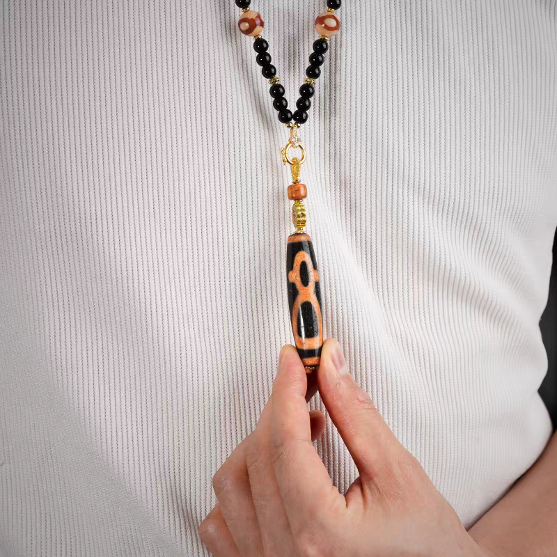  Authentic handmade ivory yellow agate necklace featuring the five directional wealth gods, showcasing jewelry art and Tibetan Buddhist Jewelry Culture.