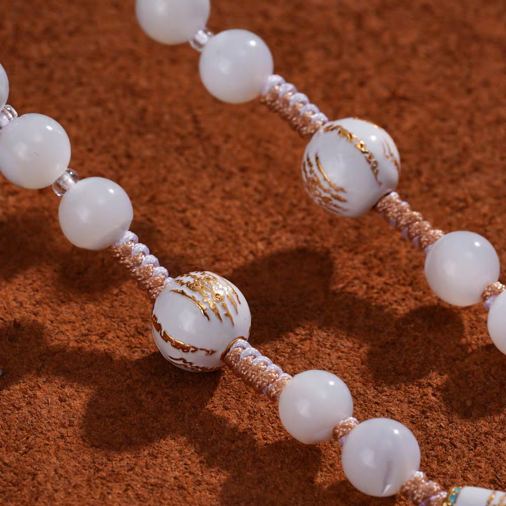 Exquisite one-eyed agate Dzi and Bodhi necklace, a spiritual artifact rooted in Tibetan Buddhist Jewelry Culture for wisdom.