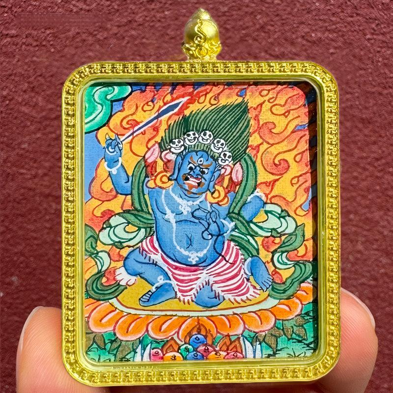 Hand-painted Tibetan Buddhist pendant featuring Manjushri and Samantabhadra, with twelve zodiac birth Buddhas and guardian deities, crafted as jewelry art.
