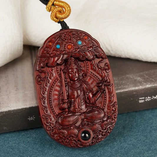 Double-sided hand-painted Red Sandalwood Zodiac pendant with Birth Buddha carving, combining Tibetan Buddhist jewelry culture and exquisite jewelry art, ideal for gifting or personal spiritual adornment.