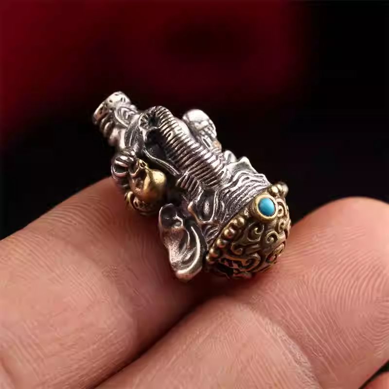 Handcrafted Tibetan silver and copper Ganesha beads connector, intricate three-connector design, spiritual accessory for bracelets and bead crafts.