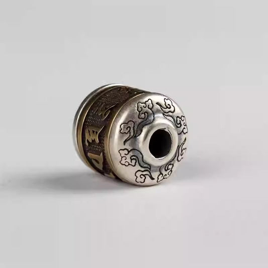 Handmade Tibetan silver and copper beads featuring six-syllable mantra spacers, ideal for assembling spiritual and ethnic-inspired bracelets.