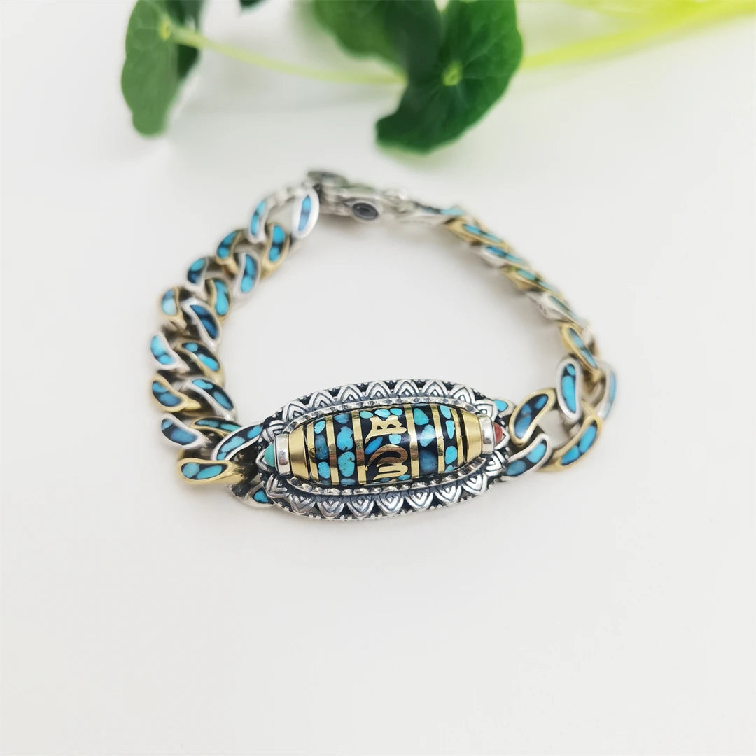 Silver Nine Eye bracelet, handcrafted with traditional Tibetan Buddhist symbols, offering spiritual protection and representing the deep wisdom of Tibetan culture.