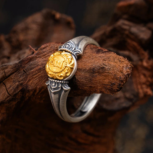 Handcrafted silver Yellow Jambhala and Green Tara ring, infused with Tibetan Buddhist symbolism for protection, prosperity, and spiritual growth.