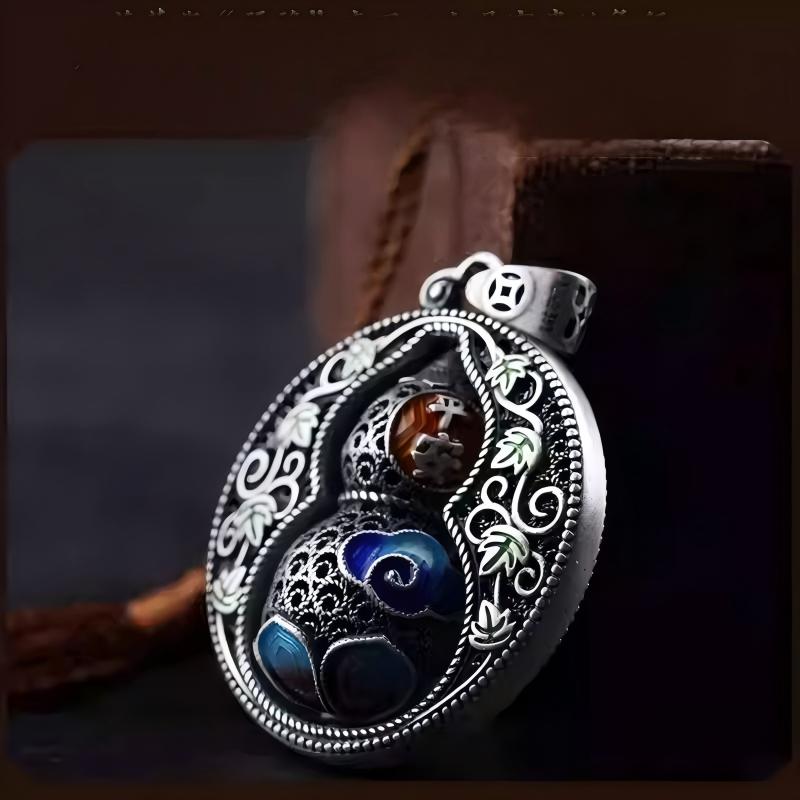 Handcrafted 999 silver Chinese-style cloisonné gourd pendant, combining traditional craftsmanship and spiritual symbolism for elegant jewelry design.