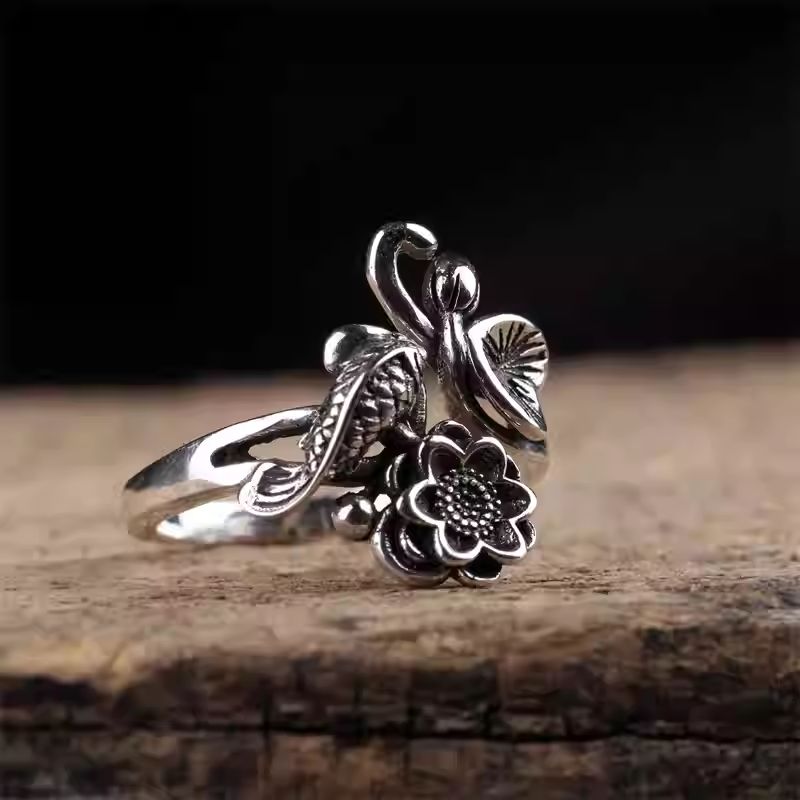  Handmade adjustable silver ring in literary style, showcasing Tibetan Buddhist Jewelry Culture and Jewelry art.