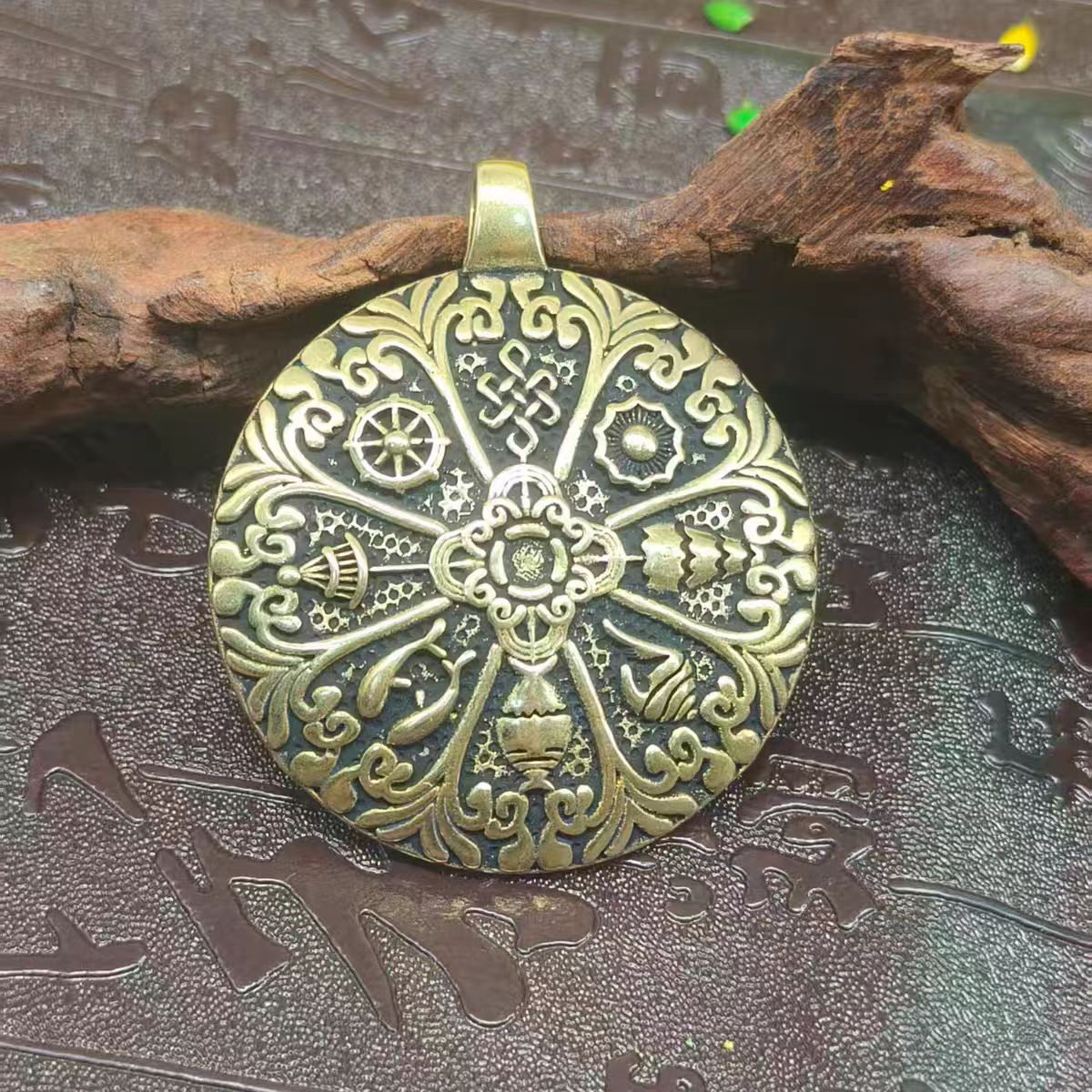 Traditional Tibetan Buddhist Bagua amulet pendant in copper, handcrafted jewelry art for attracting good fortune and spiritual protection.
