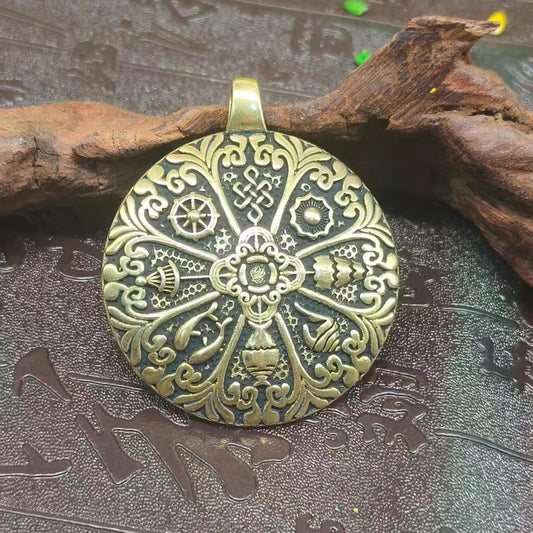 Traditional Tibetan Buddhist Bagua amulet pendant in copper, handcrafted jewelry art for attracting good fortune and spiritual protection.