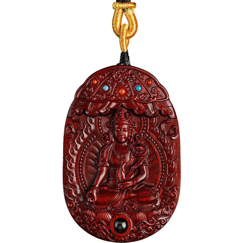 Unique handmade Red Sandalwood rotating pendant with Zodiac and Birth Buddha carvings, reflecting Tibetan Buddhist jewelry culture and artisan jewelry art, suitable for collectors and spiritual practitioners.