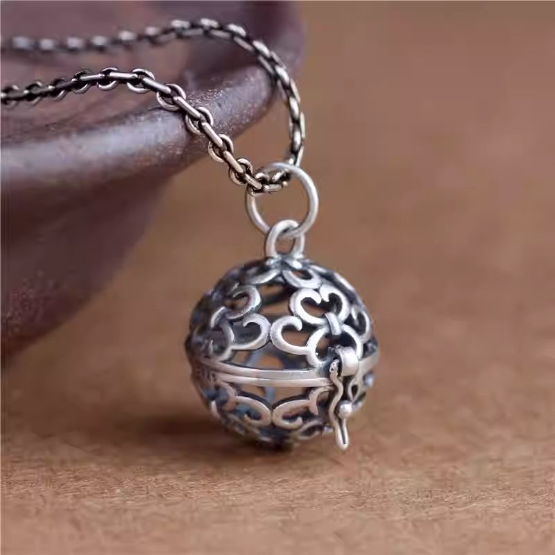 Handmade vintage scent diffuser necklace with Tibetan Buddhist Jewelry Culture patterns, showcasing unique Jewelry art.