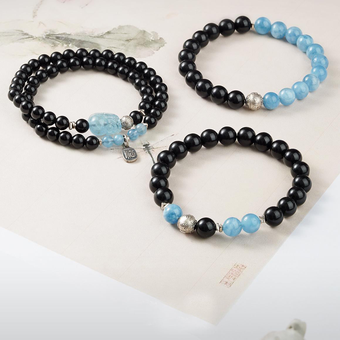 Tibetan Buddhist Jewelry Art: Handmade Obsidian and Aquamarine Bracelet "Evening Cloud" for grounding and emotional balance